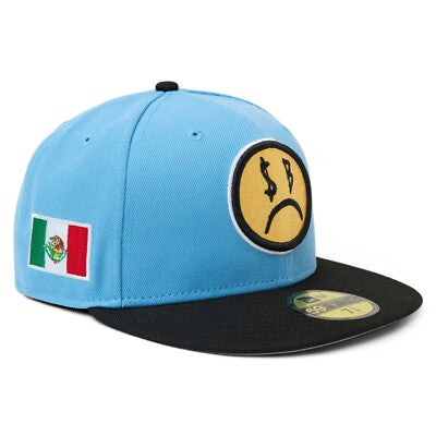 New Era X Junior H SB X NEW ERA SAD FACE SNAPBACK HAT SKY BLUE